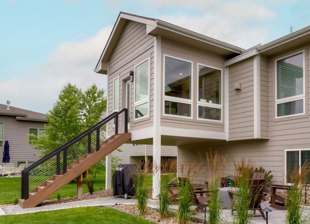 Completed addition, exterior, showing how new structure meets the existing house